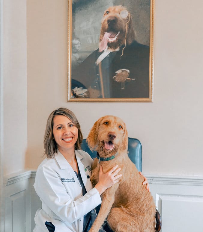 Dr. Heather Brookshire with her Wire-haired Vizsla pup named Orin