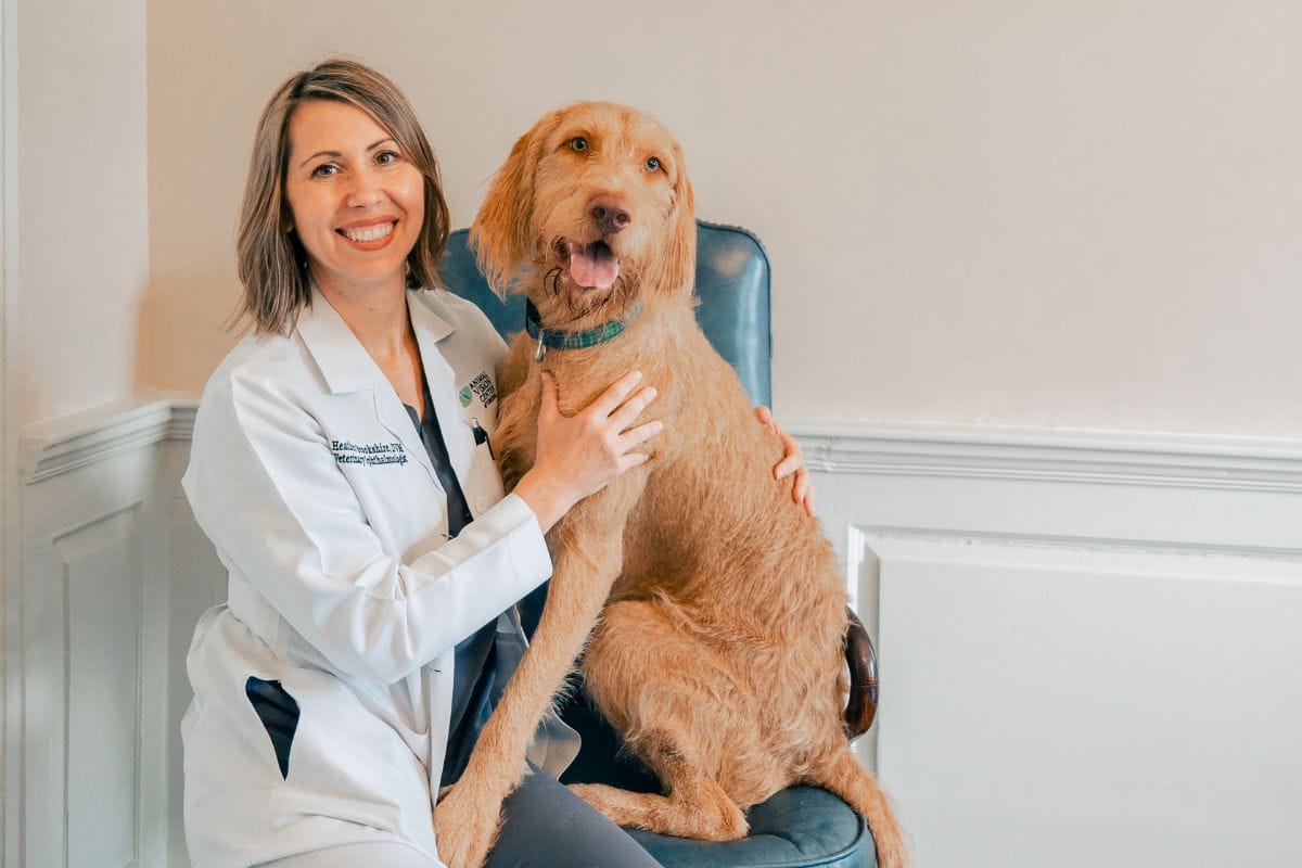Dr. Heather Brookshire with her Wire-haired Vizsla pup named Orin